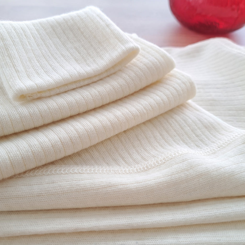 Undyed merino wool fabric texture close up chemical free