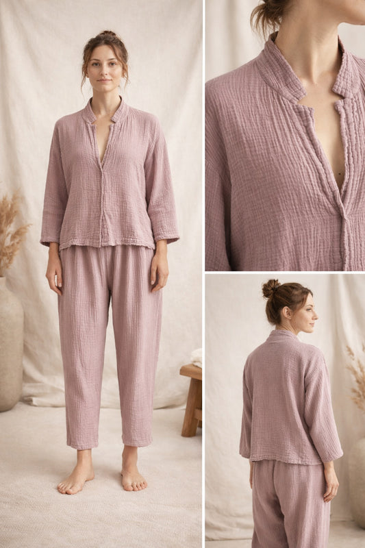Model wearing a naturally dyed muslin lounge set in powder lilac, 100% cotton double gauze top and ankle-length pants.