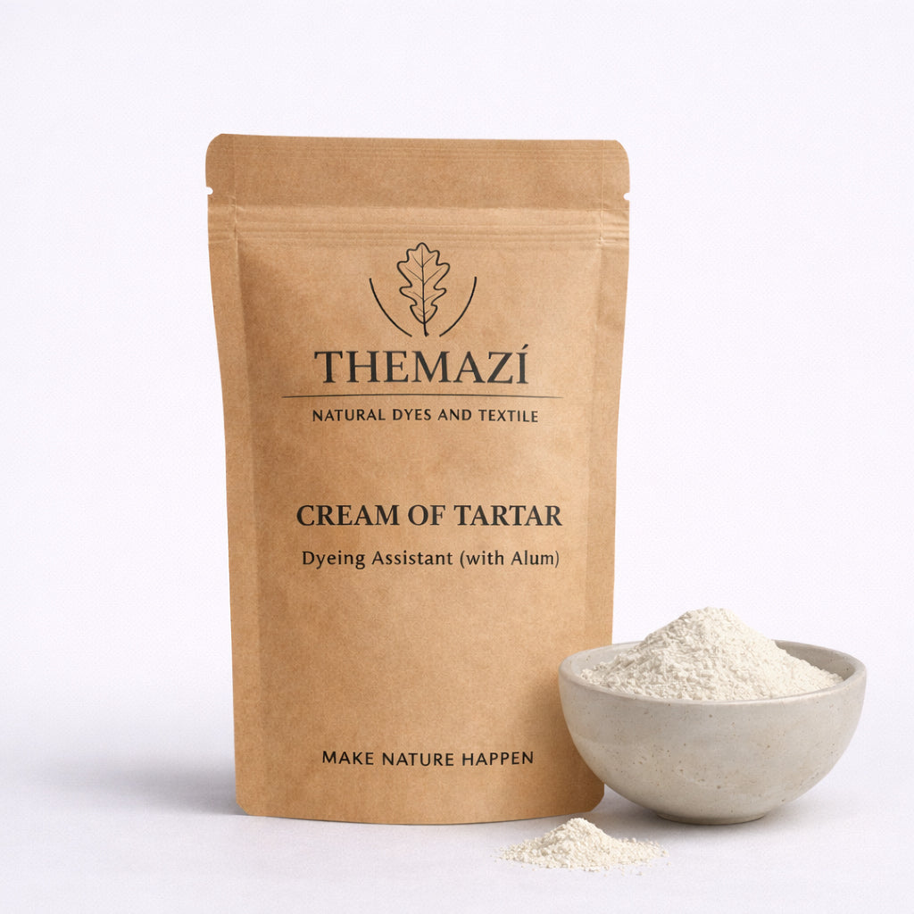 TheMazi Cream of Tartar dyeing assistant (with alum) in kraft pouch with a bowl of white powder on a studio background
