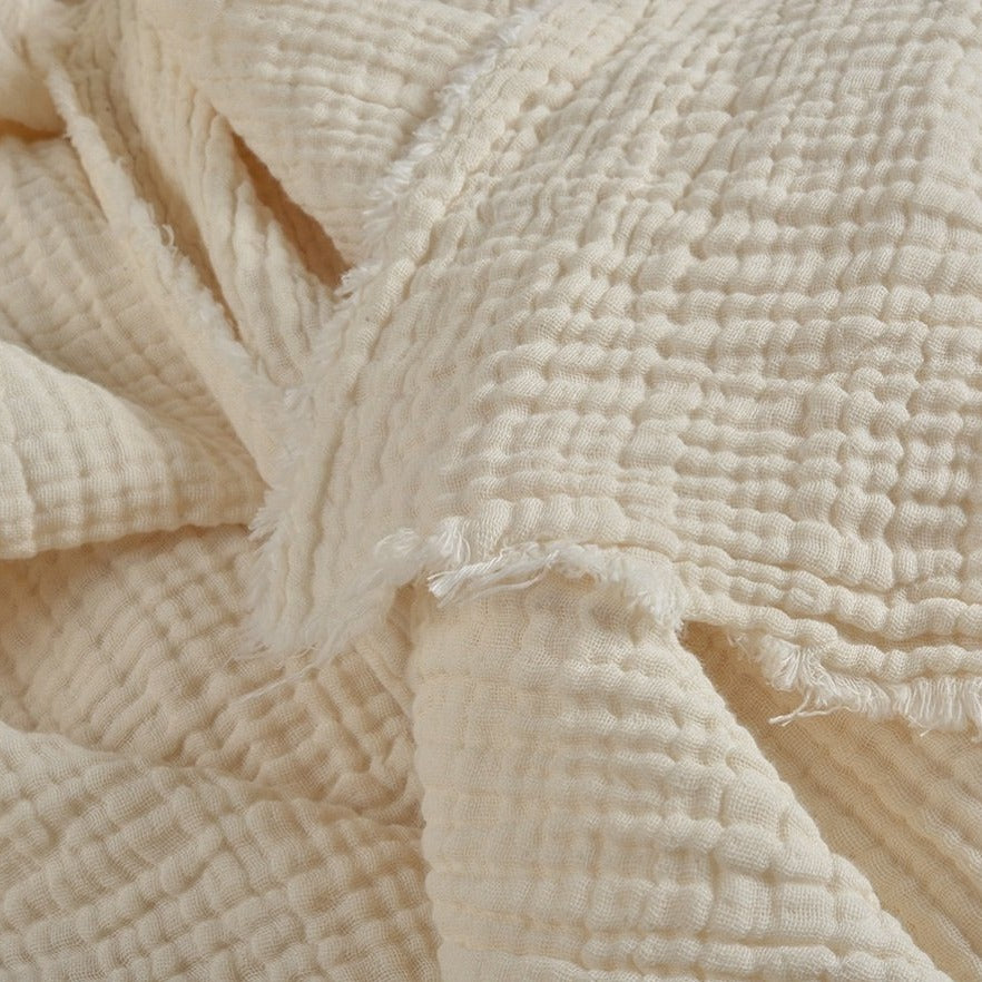 Close-up of undyed cotton muslin prepared for natural dye application